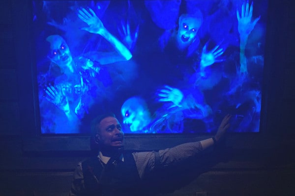 Ghosts behind man